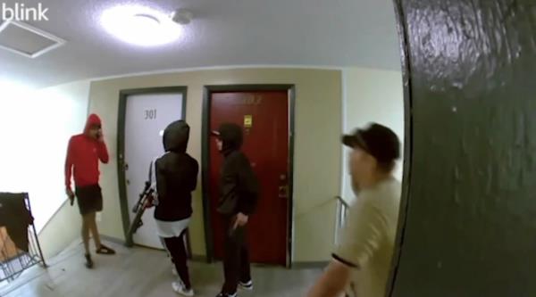 Suspected members of the Venezuelan transnational gang Tren de Aragua hold firearms inside an apartment complex in Aurora, Colorado in August.